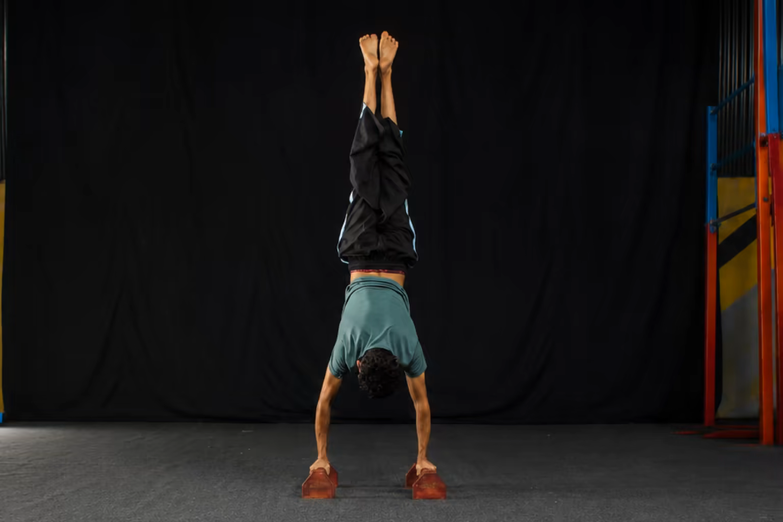 The handstand that once felt impossible.